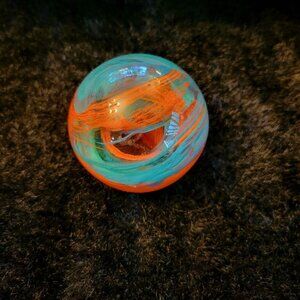 Paperweight A Vibrant Internal Swirl Design With Orange And Turquoise Color